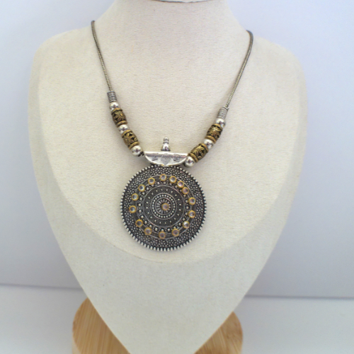 Sun boho medal.
